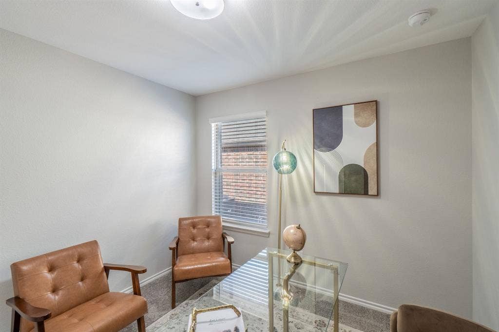 1842 Shady Elm Drive, Lancaster, TX 75146 Recessed lighting illuminates neutral-toned walls and carpeted flooring