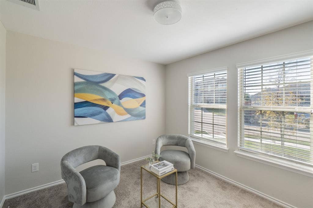 1842 Shady Elm Drive, Lancaster, TX 75146 Recessed ceiling lighting, two windows with blinds, and light gray wall paint