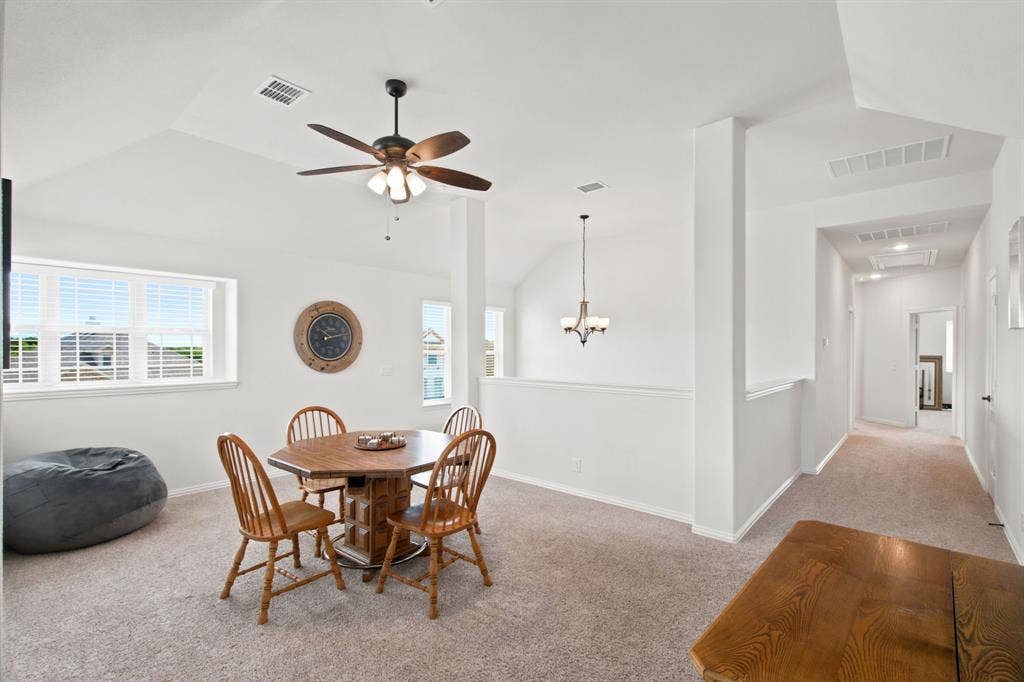 1218 Misty Ridge Drive, Justin, TX 76247 Vaulted ceiling featuring a ceiling fan with integrated lighting