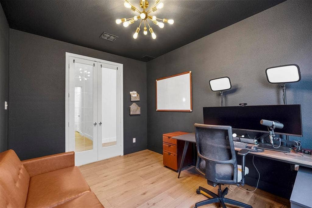 1506 Carnation Street, Celina, TX 75078 Light wood-finish flooring with dark painted walls