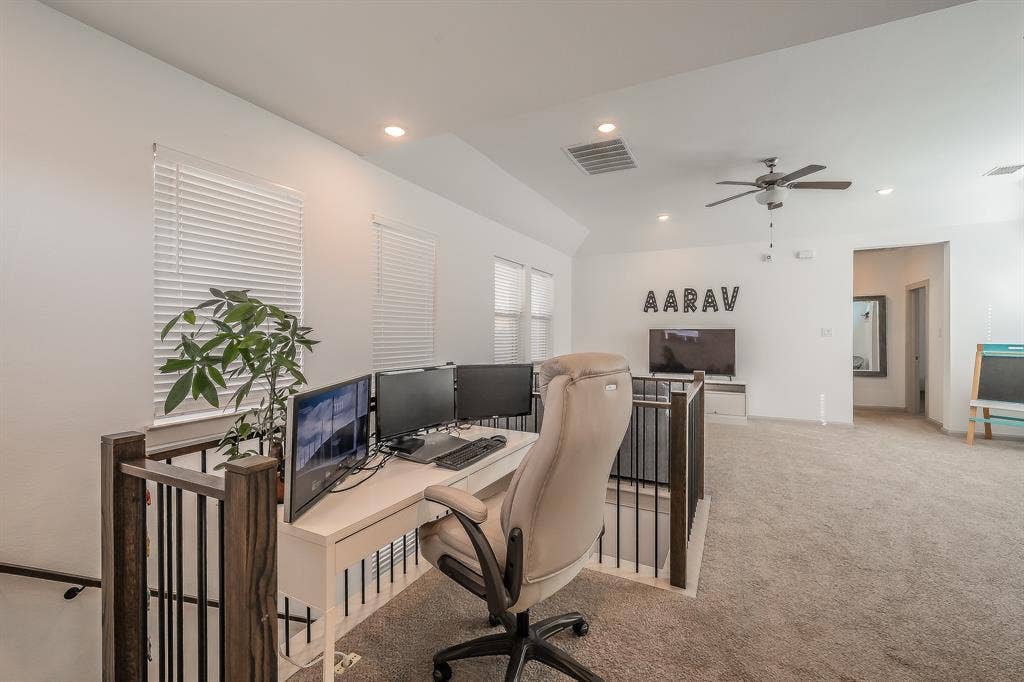Loft space features a perfect area for a desk