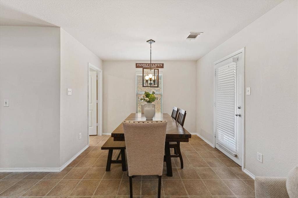 2053 Lake Trail Drive, Heartland, TX 75126 Tiled flooring with neutral-toned walls
