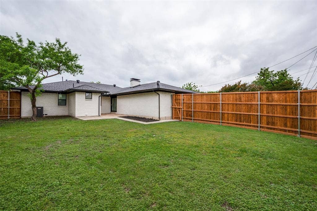 5311 Banting Way, Dallas, TX 75227 Large backyard with privacy fence