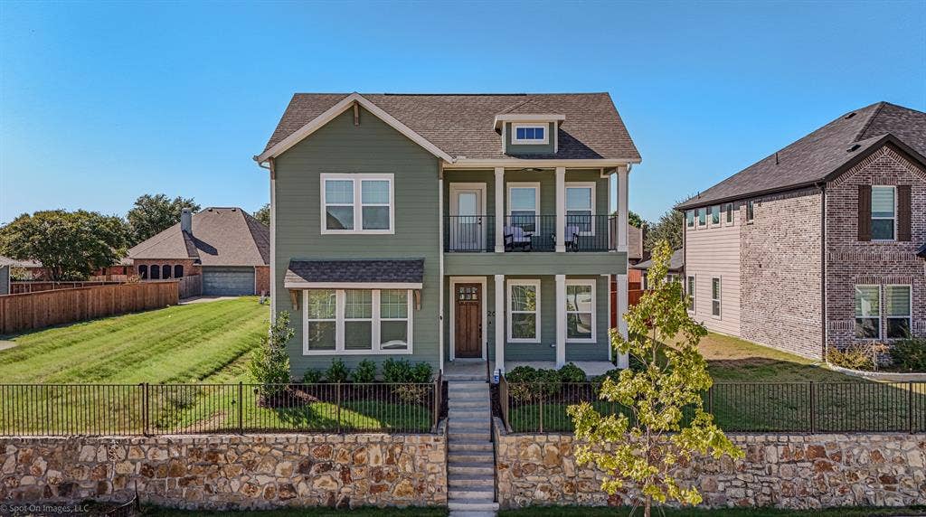 2601 Lafayette Drive, Rowlett, TX 75088 Two-story residence with green siding and white trim