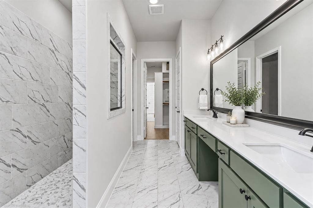 2601 Lafayette Drive, Rowlett, TX 75088 Walk-in shower with tiled walls and pebble-style floor