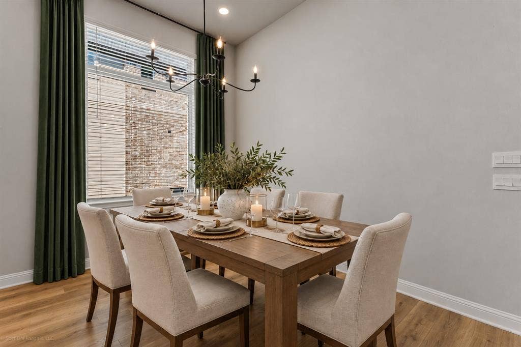 2601 Lafayette Drive, Rowlett, TX 75088 Wood-finish flooring, recessed lighting, and a modern chandelier