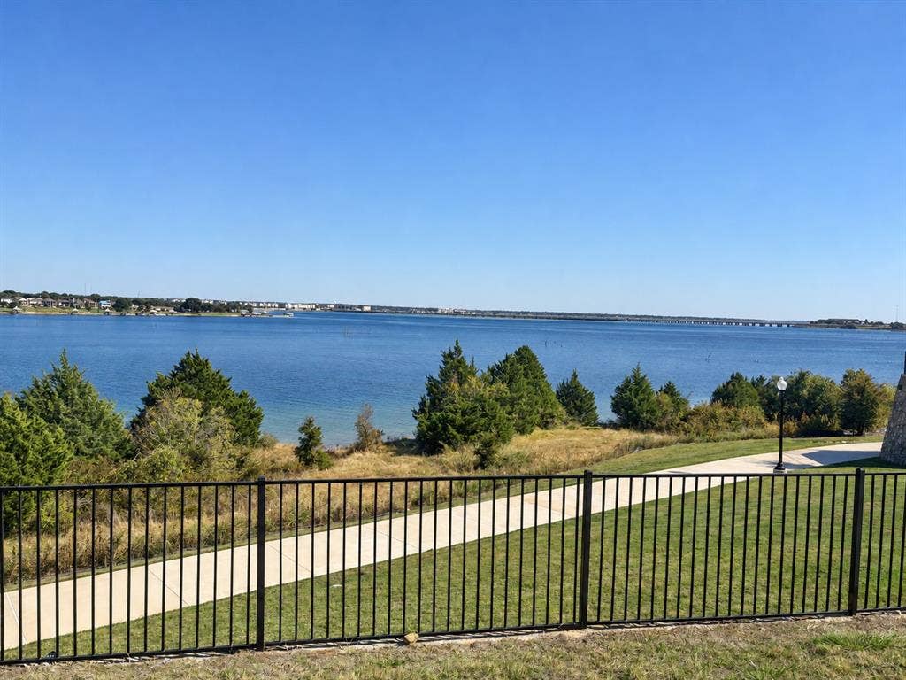 2601 Lafayette Drive, Rowlett, TX 75088 Expansive waterfront setting with an integrated pedestrian path