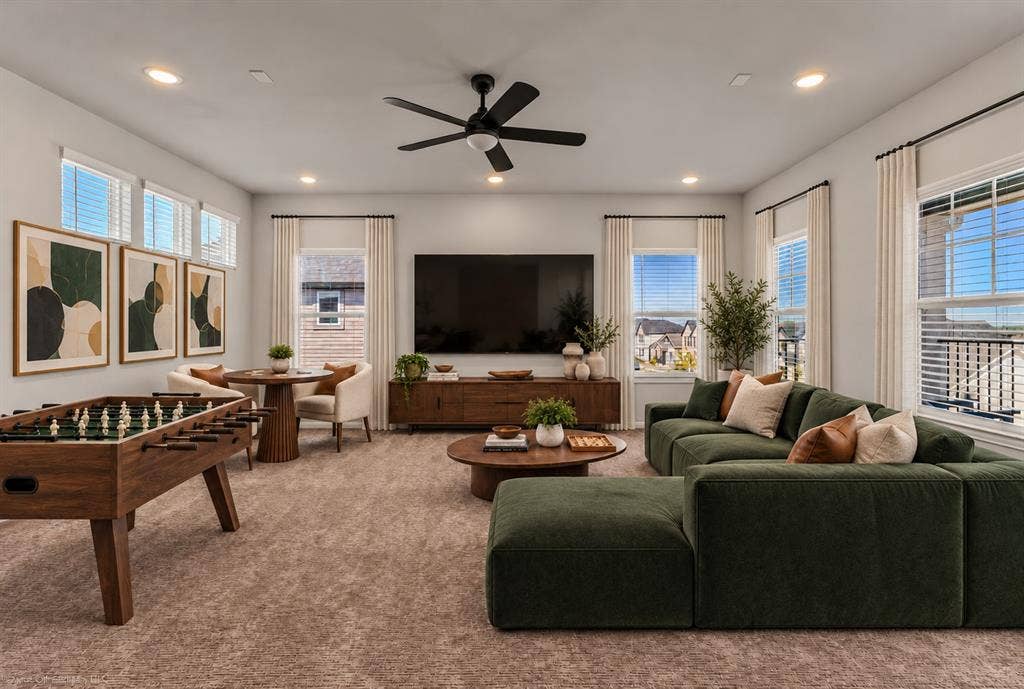 2601 Lafayette Drive, Rowlett, TX 75088 Recessed lighting, ceiling fan, multiple windows with blinds, and carpeted flooring