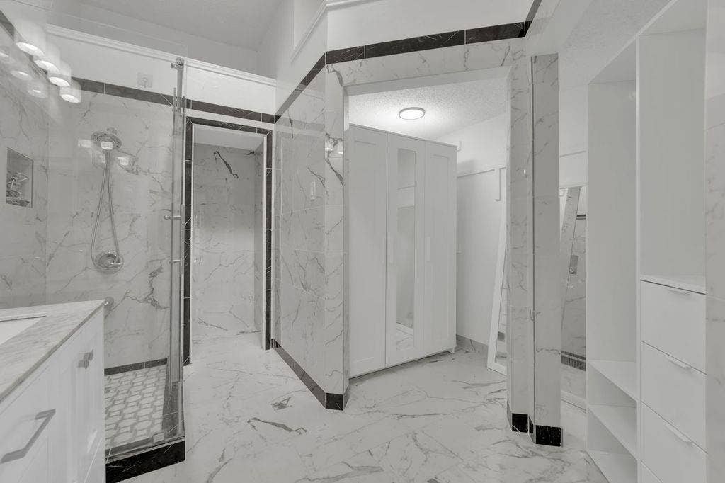 Marble-look tile flooring and accent trim