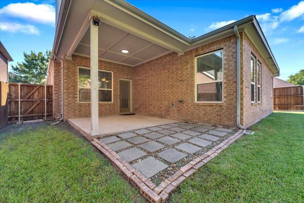 5612 Hampshire Drive, McKinney, TX 75070 Covered patio with recessed lighting, brick exterior, and a paver stone extension