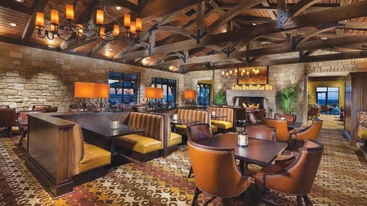 The Wildhorse Grill is an on-site restaurant with a bar, lounge, outdoor patio, and golf-course views