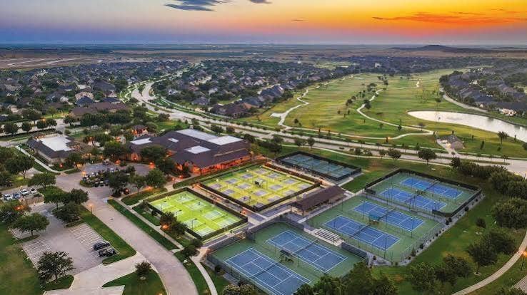 The Cimarron Sports Club at Robson Ranch offers resort-style fitness and recreation, featuring indoor swimming, fitness facilities, and spaces designed for an active lifestyle.