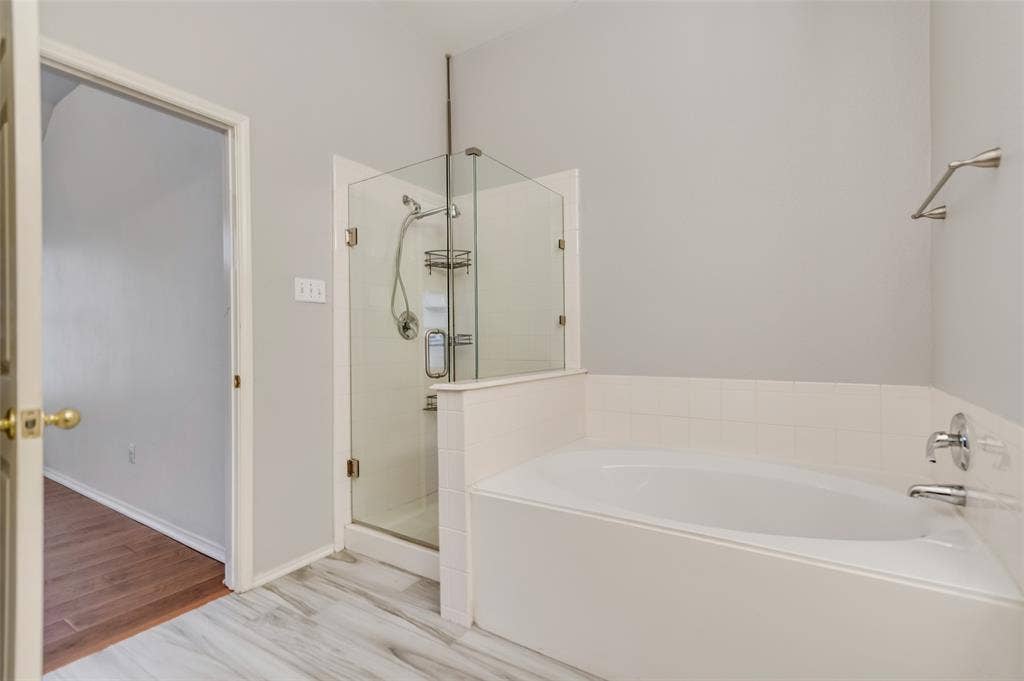 5100 Geranium Court, McKinney, TX 75070 Master bath upgraded walk in shower and bath tub