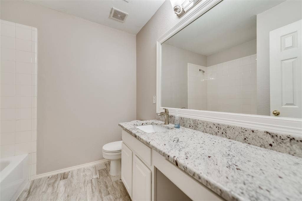 5100 Geranium Court, McKinney, TX 75070 Second full bath with granite counter tops