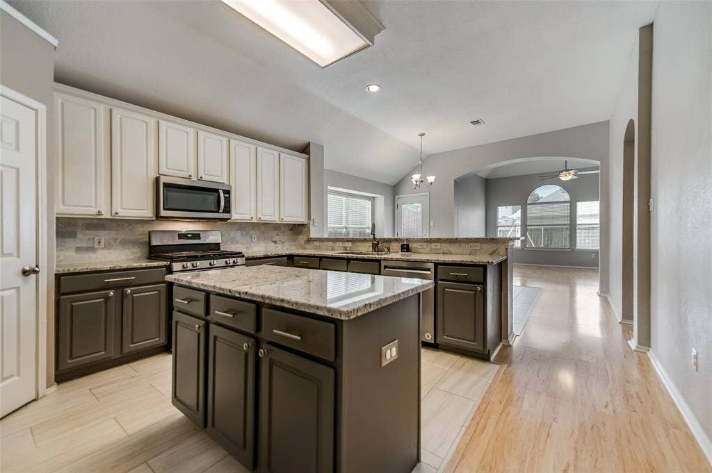 5100 Geranium Court, McKinney, TX 75070 From kitchen looking out to adjacent spacious breakfast area and 2nd living room