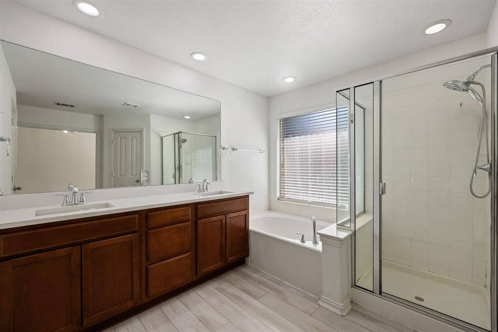 221 Cliffbrook Drive, Wylie, TX 75098 Dual vanity with undermount sinks and wood cabinetry