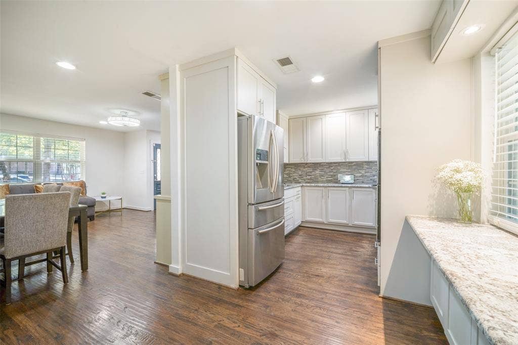 3209 Karla Drive, Mesquite, TX 75150 Kitchen featuring stainless steel appliances, white cabinetry, tile backsplash, and recessed lighting