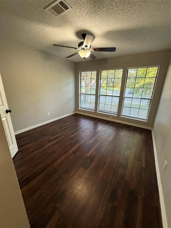 3407 Ruidoso Drive, Arlington, TX 76017 Rich wood-finish flooring complemented by neutral wall tones