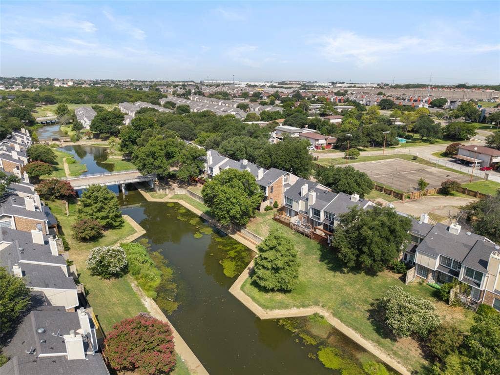 4414 Westminster Drive, Irving, TX 75038 Waterfront property with multi-level dwellings, private decks, and mature trees