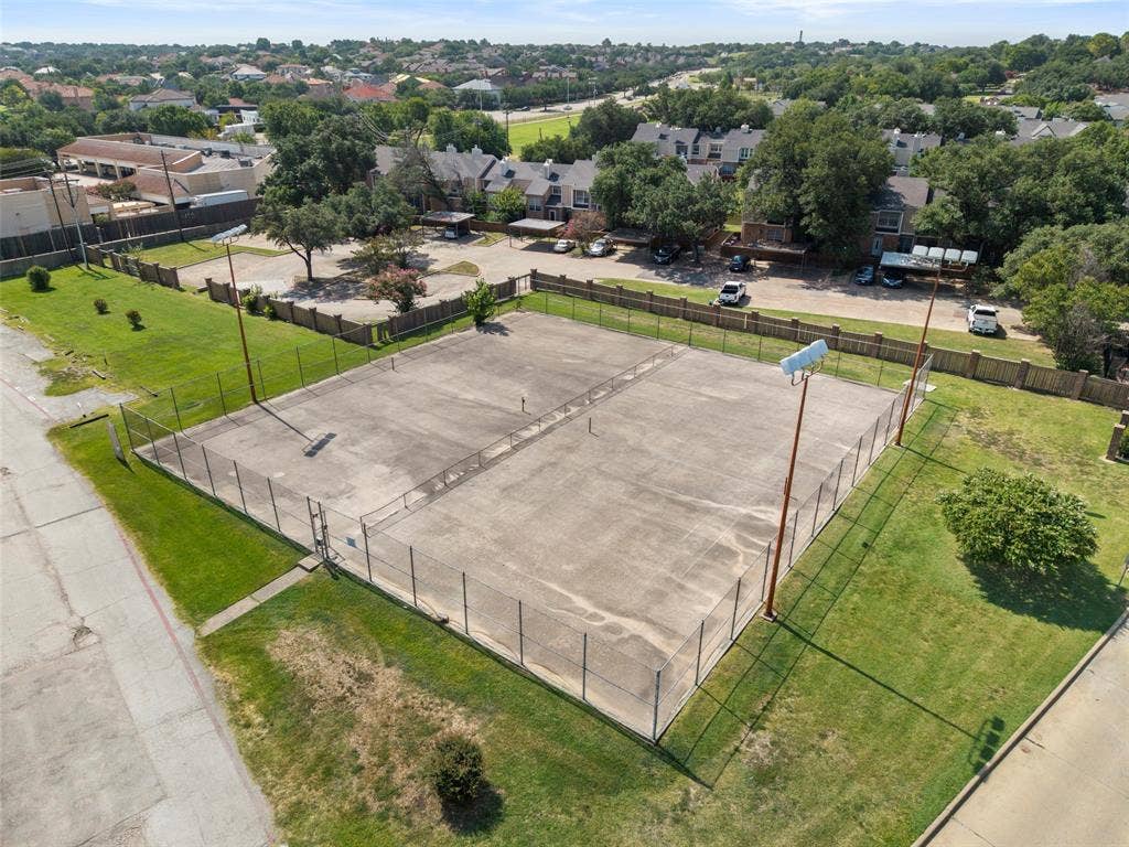 4414 Westminster Drive, Irving, TX 75038 Concrete court with perimeter fencing
