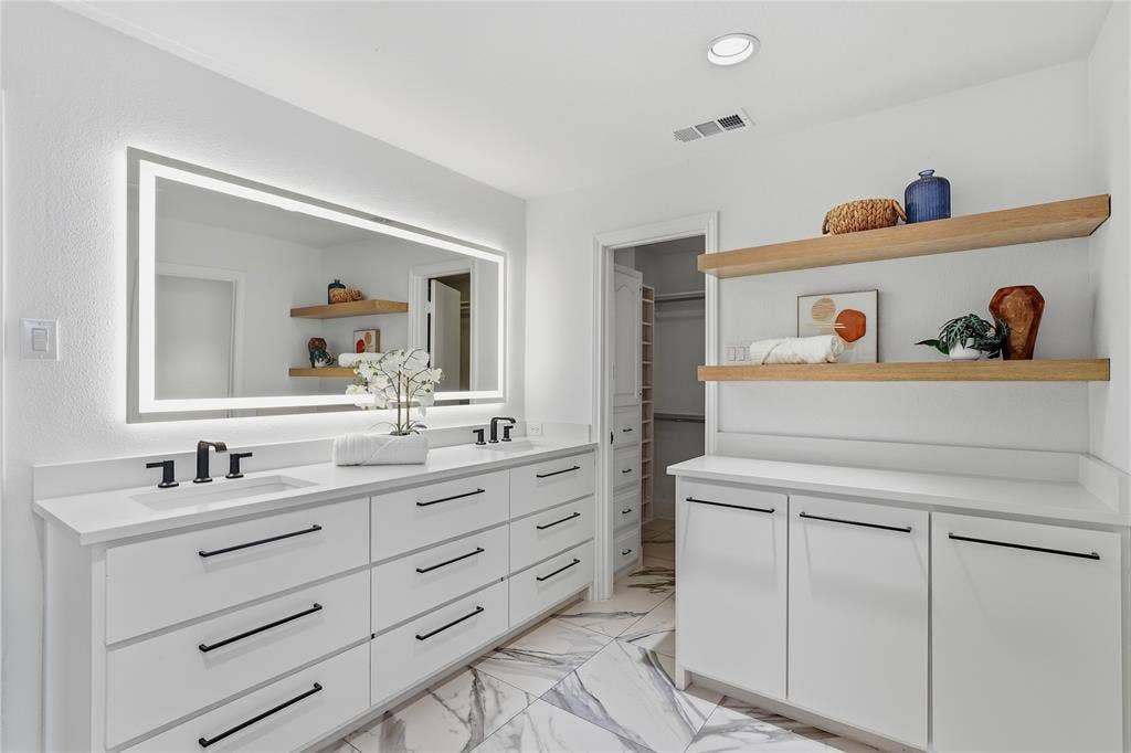 Dual vanity with rectangular undermount sinks and matte black fixtures