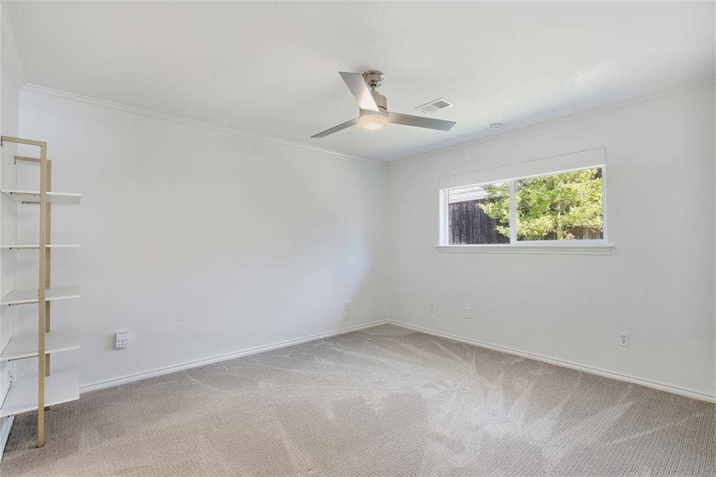 Recessed lighting, ceiling fan with integrated light, built-in shelving, carpet flooring, window with natural light