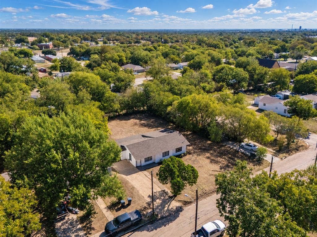3709 N 22nd Street, Waco, TX 76708 Single-story residence with a white exterior and a dark roof