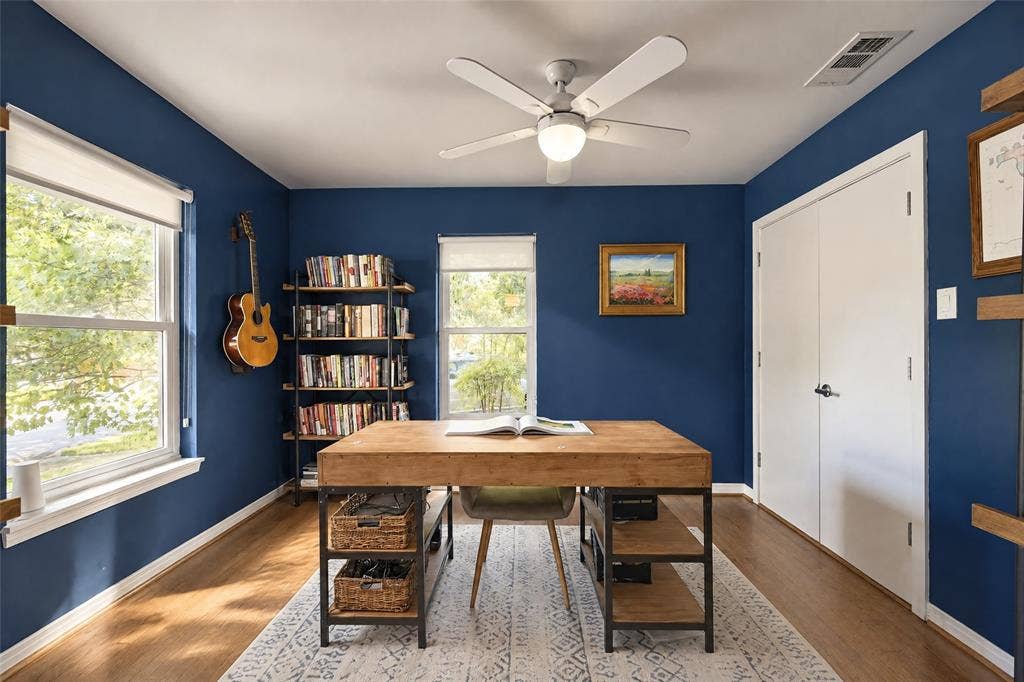 6866 Burwood Lane, Dallas, TX 75214 Recessed lighting with a ceiling fan, dual windows, wood-finish flooring, and built-in shelving