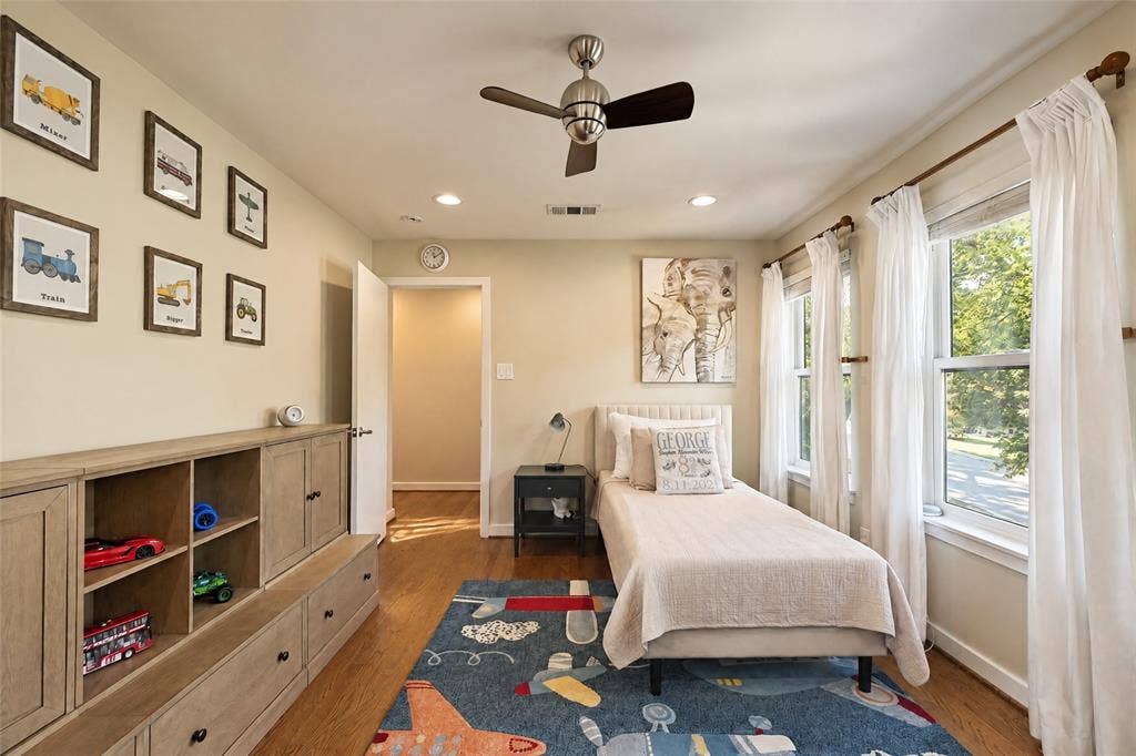 6866 Burwood Lane, Dallas, TX 75214 Wood-finish flooring, recessed lighting, and a ceiling fan
