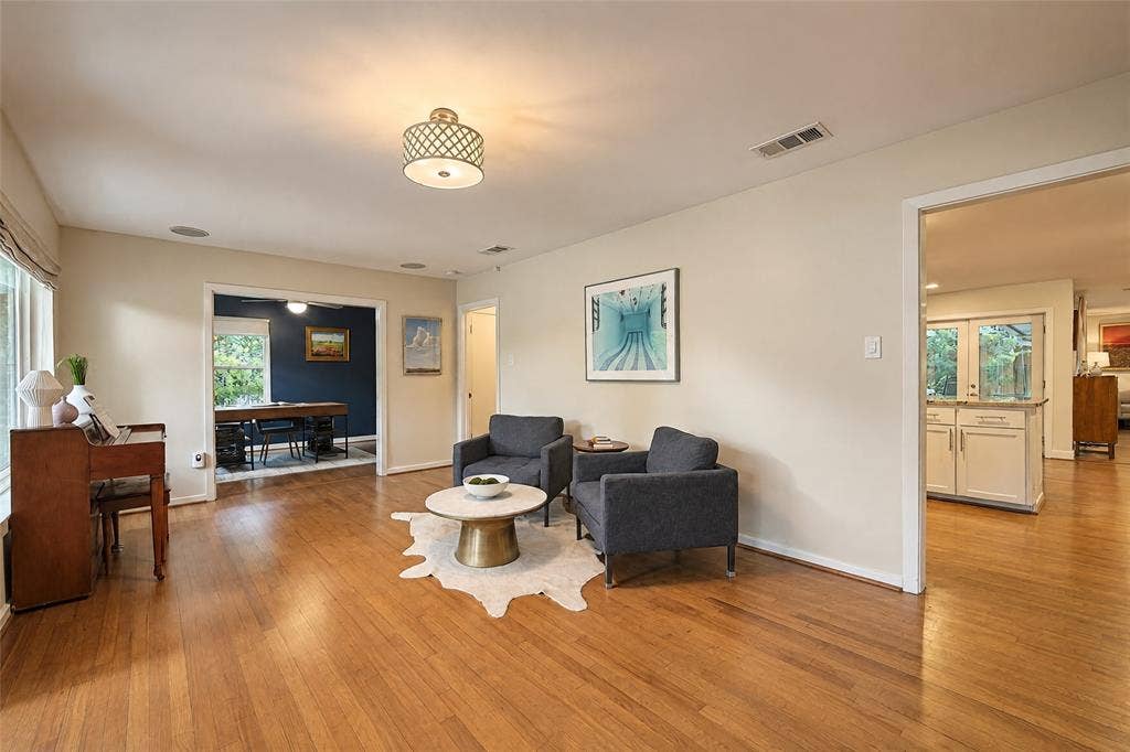 6866 Burwood Lane, Dallas, TX 75214 Hardwood flooring throughout, recessed ceiling lighting, and a drum-style ceiling fixture