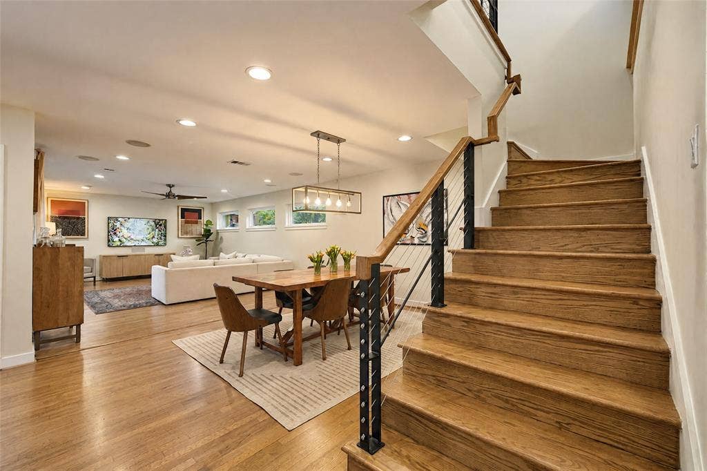 6866 Burwood Lane, Dallas, TX 75214 Hardwood flooring, recessed lighting, and a modern staircase with cable railing