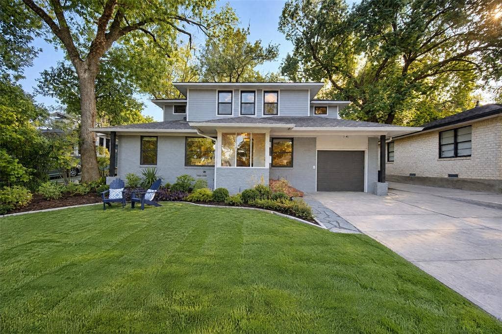 6866 Burwood Lane, Dallas, TX 75214 Modern exterior with light gray siding and dark trim windows