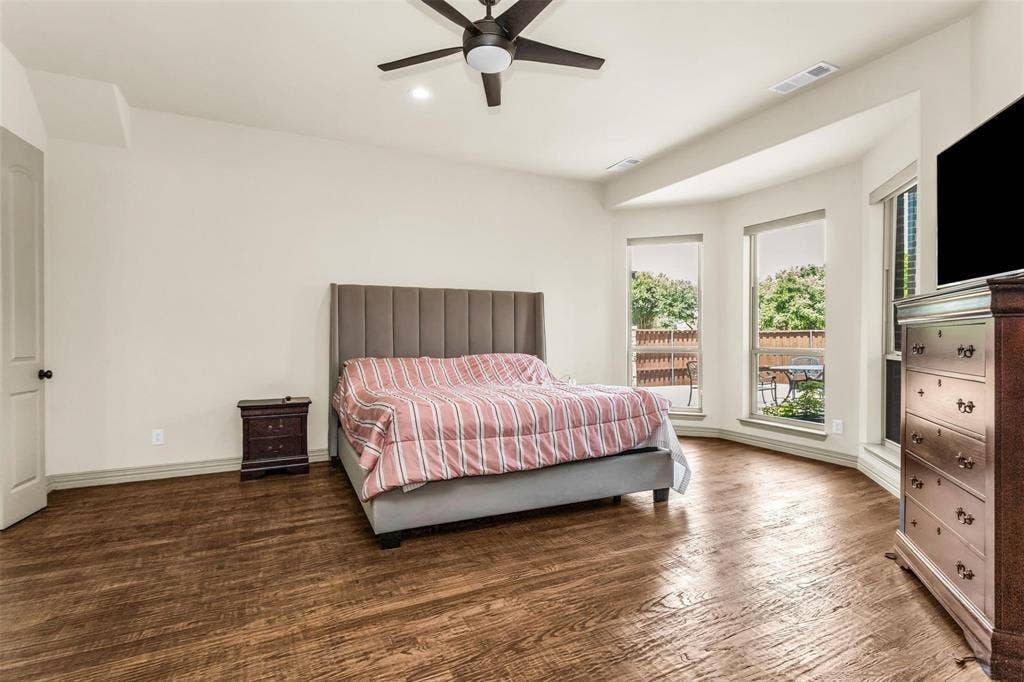 1838 Olney Drive, Allen, TX 75013 Hardwood flooring, ceiling fan, recessed lighting, and bay windows