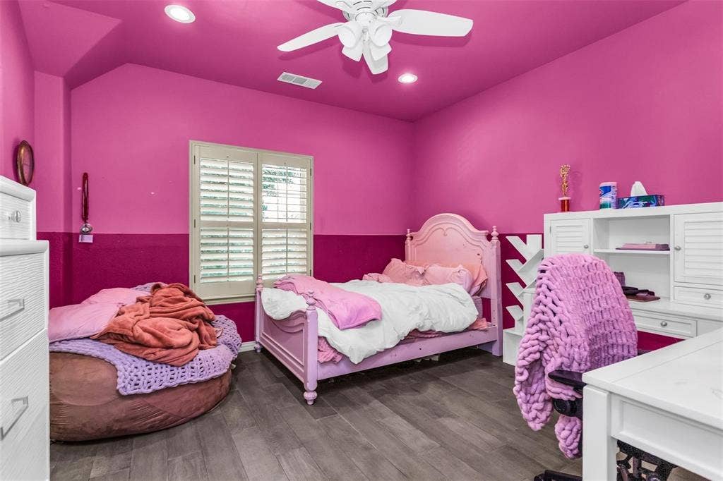 1838 Olney Drive, Allen, TX 75013 Wood-finish flooring, plantation shutters, and a ceiling fan with integrated lighting
