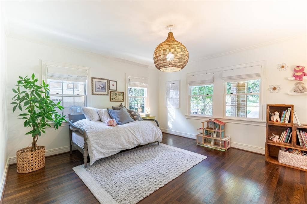 Woohoo! The west-facing bedroom is nearly 210 SF of space with a custom-designed closet.