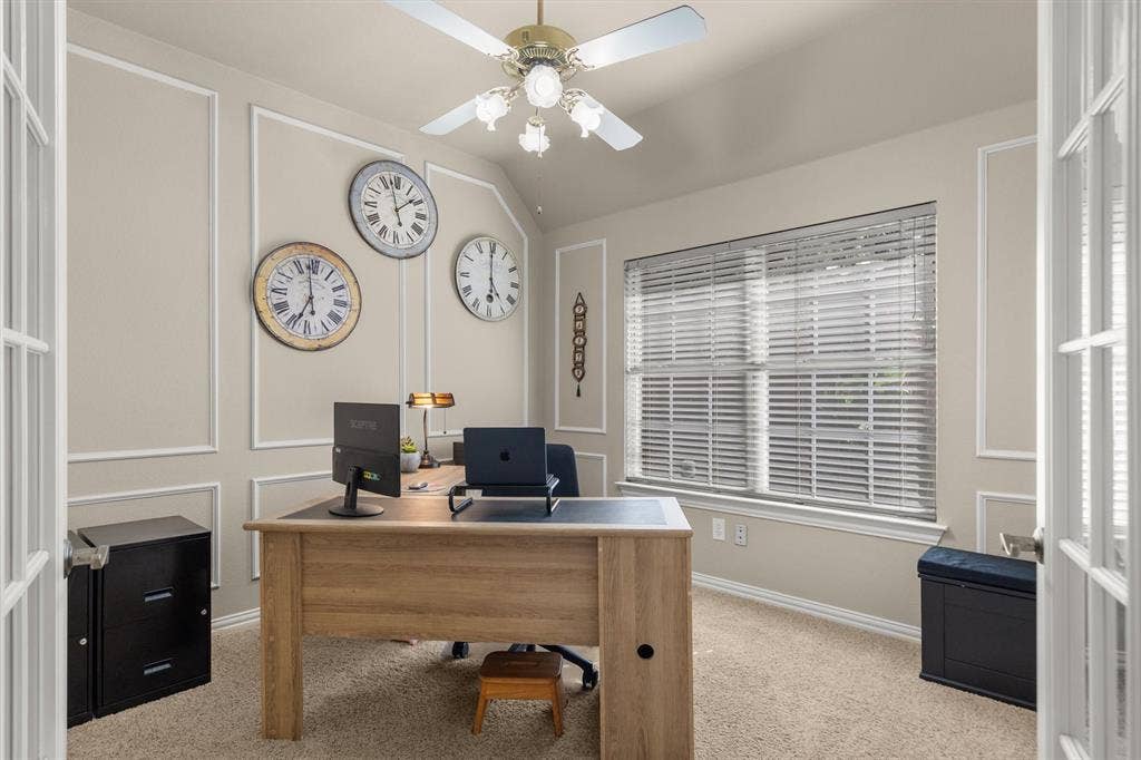 This is a room connected to the primary bedroom that could be used as an office, gym or nursery