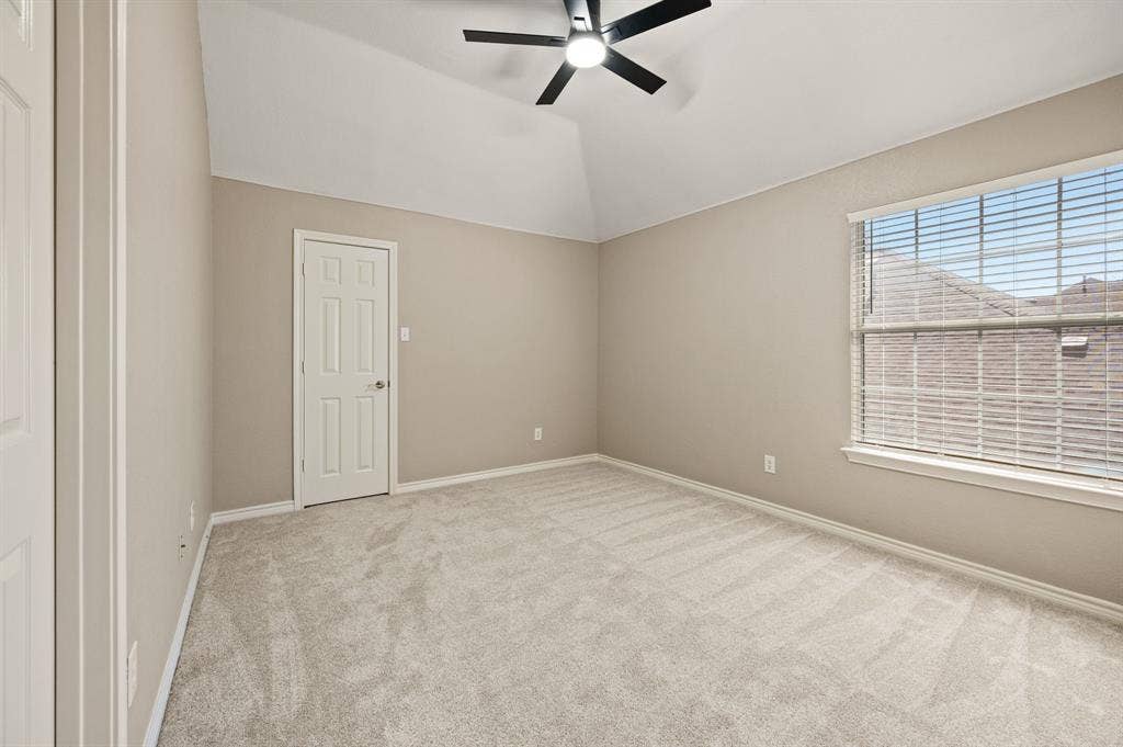Settle into this inviting bedroom with a broad window, new carpet & plenty of space to create your own comfortable retreat.