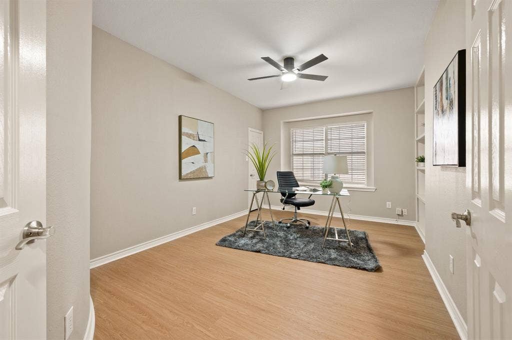 Working from home looks good here! Currently staged as an office, this versatile room could also be a secondary room if needed!