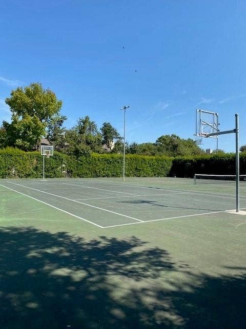 9326 Emberglow Lane, Dallas, TX 75243 View of tennis court featuring community basketball court