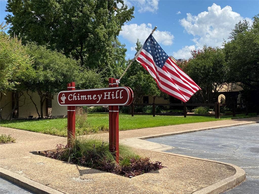 9326 Emberglow Lane, Dallas, TX 75243 View of home's community with a yard