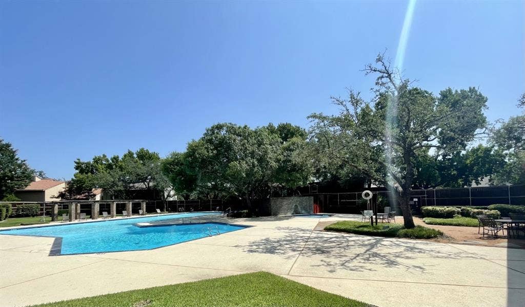9326 Emberglow Lane, Dallas, TX 75243 Community pool with a patio area