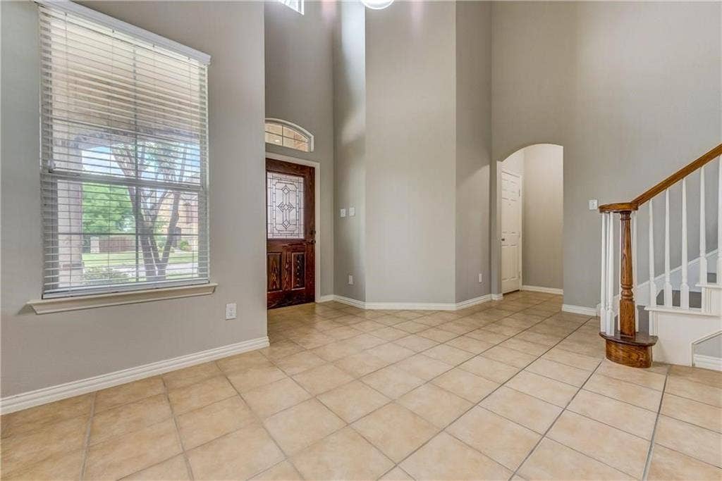 2300 Reston Drive, McKinney, TX 75072 Tiled foyer with a towering ceiling
