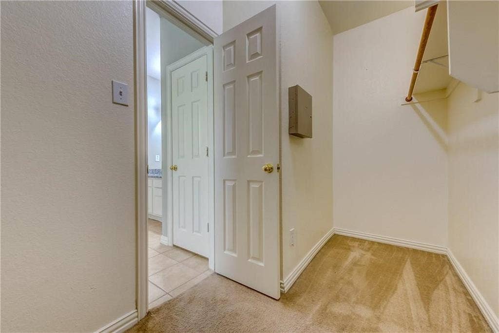 2300 Reston Drive, McKinney, TX 75072 Walk in closet with light carpet
