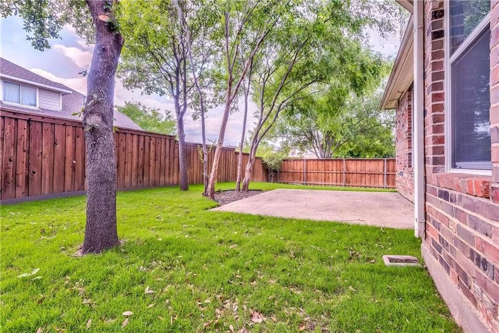 2300 Reston Drive, McKinney, TX 75072 View of yard with a patio area