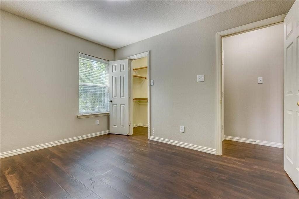 2300 Reston Drive, McKinney, TX 75072 Empty room with dark hardwood / wood-style flooring
