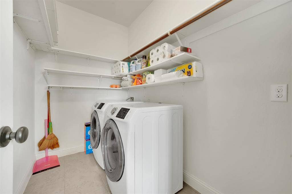 302 Torch Lily Lane, Wylie, TX 75098 Laundry area with integrated shelving and a clothes rod