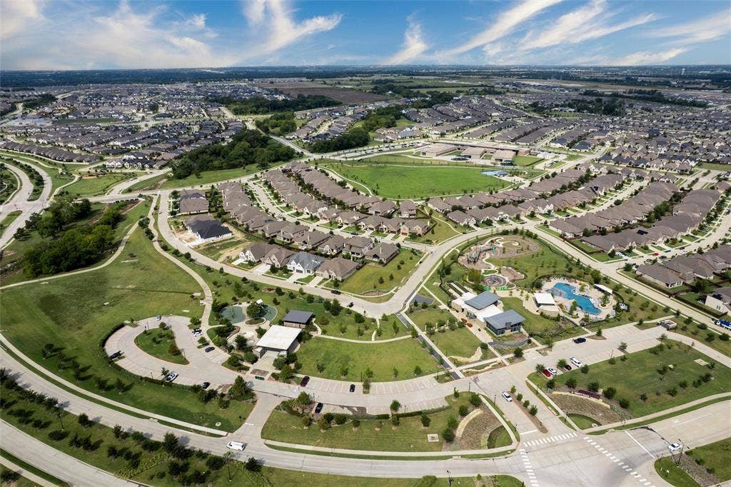 7601 Calhoun Cove, McKinney, TX 75071 Sprawling community with extensive green spaces, a large recreational pool, multiple playgrounds, and paved walking paths
