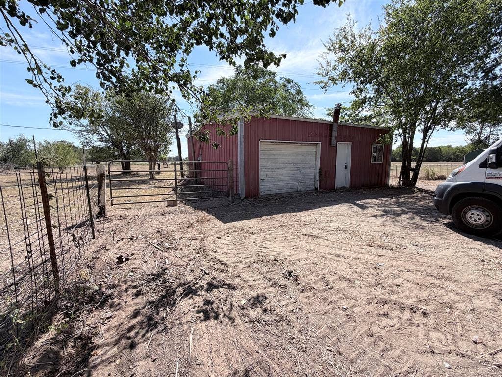 TBD Lot 2 Cedar Creek Parkway W, Kemp, TX 75143 front of barn/shop. Gate is to the right.
