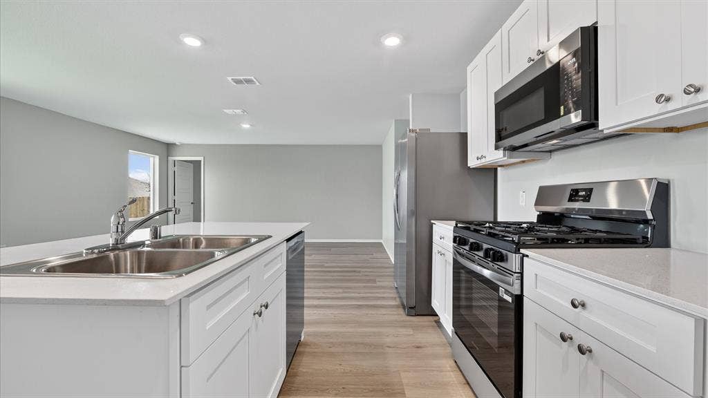 Kitchen - All Home and community information, including pricing, included features, terms, availability and amenities, are subject to change at any time without notice or obligation. All Drawings, pictures, photographs, video, square footages, floor plans, elevations, features, colors and sizes are approximate for illustration purposes only and will vary from the homes as built.