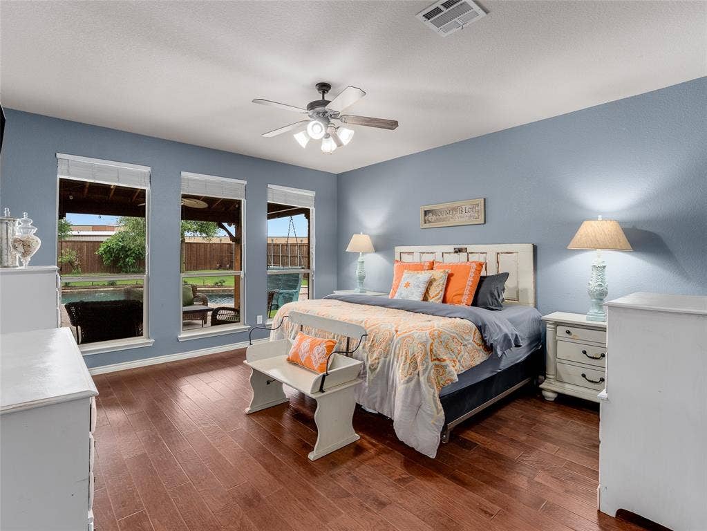 5732 Chateau Drive, Sachse, TX 75048 Primary overlooking pool and covered patio.